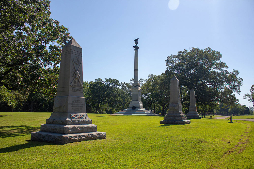 Shiloh-Tennessee Shiloh National Military Park with trees and monuments on a beautiful sunny day.